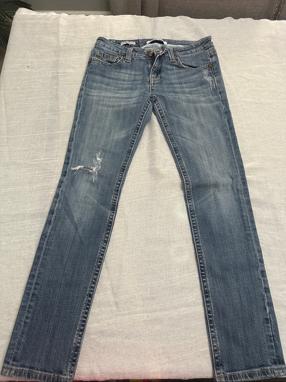 Women’s Light Blue Distressed Slim Capri Jeans